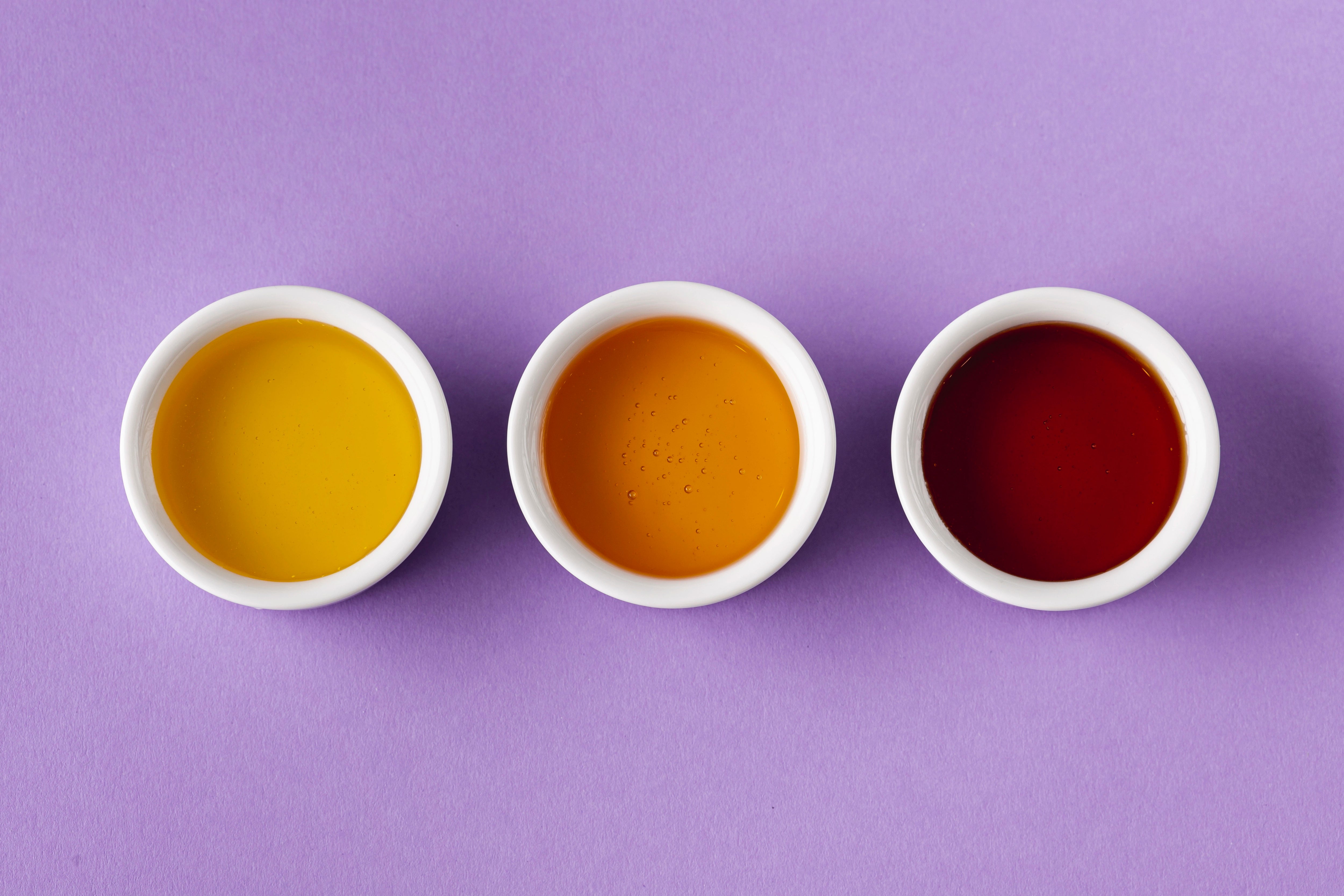 Mehrweg Dipbecher vor neutralem Hintergrund.